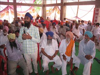  Farmers sharing their views during the interactive session.