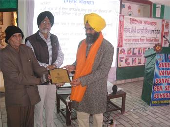 Dr. Varinderpal Singh, being honoured by the school management committee.