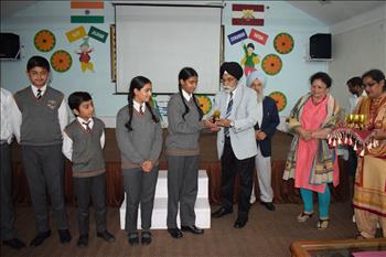 S.Amarjit Singh, Executive Director, Dagshai Public School( Solan, HP) presenting awards to students after competition 