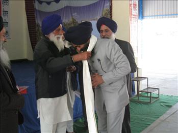 Dr. Varinderpal Singh being honoured by the school Management committee