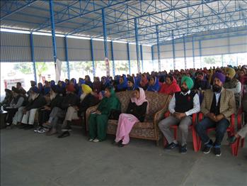 Participants engrossed in Dr. Varinderpal Singhs oration during the session