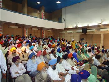 The jam-packed hall can be seen with delegates from different parts of country.