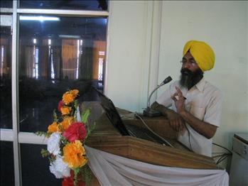 Dr. Varinderpal Singh stressing on some key points during the talk.